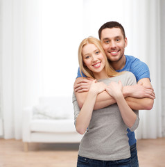 Fototapeta premium smiling couple hugging