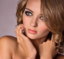 Portrait of beautiful young woman with makeup