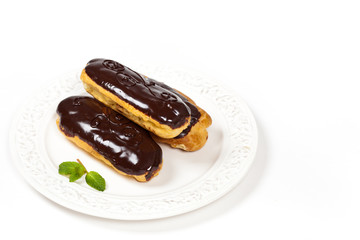 Homemade eclairs with cream