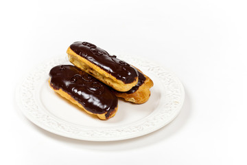 Homemade eclairs with cream