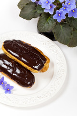 Homemade eclairs with cream