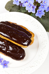 Homemade eclairs with cream
