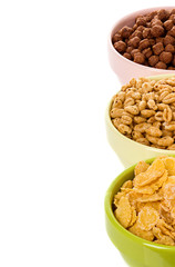 assortment dry cereal, flakes  for breakfast, isolated on white