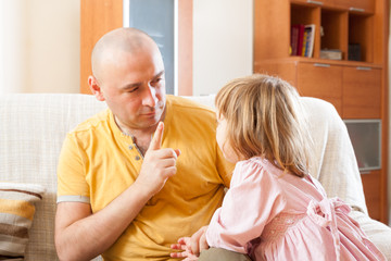 dad berates   child
