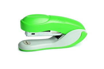 Green stapler isolated on white background