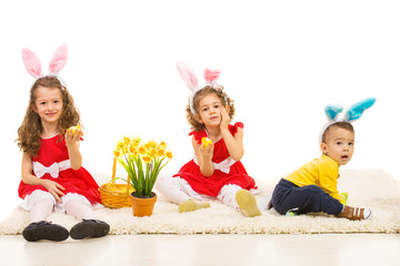 Three kids with bunny ears