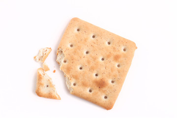 broken biscuits on a white background