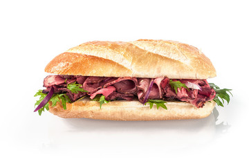 Rare roast beef and fresh rocket on a baguette