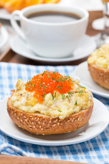 scramble eggs on a bun for breakfast, vertical