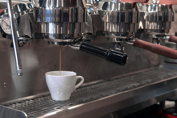 Espresso pouring into a cup