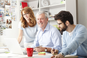 Business colleagues working on a laptop