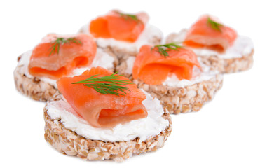 Delicious canapes isolated on white