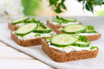Delicious canapes on table close-up