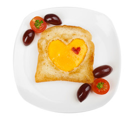 Scrambled eggs with bread on plate, on color napkin