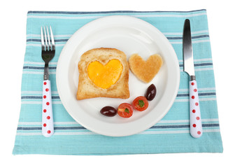 Scrambled eggs with bread on plate, on color napkin