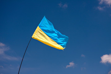 Ukrainian  flag on the sky background