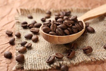 Coffee beans on table close-up