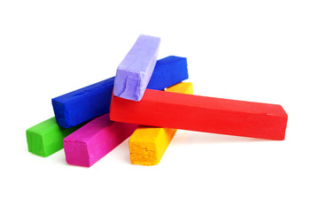 Colorful chalks on a white background