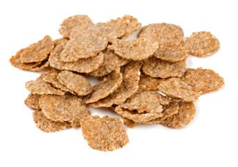 pile of bran flakes isolated on white
