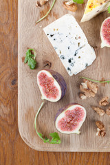 Cheese board with figs and nuts