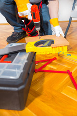 Male Worker laminate, parquet flooring