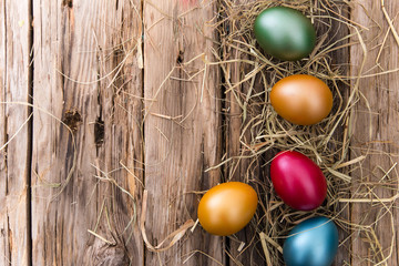 Easter eggs on wooden background