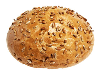 A loaf of delicious homemade bread with sunflower seeds isolated