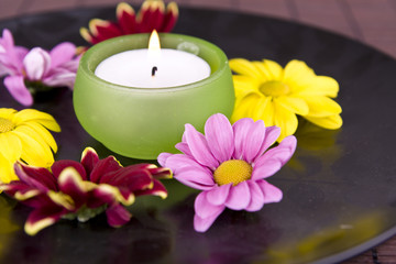 Plakat spa motive with flowers and candle