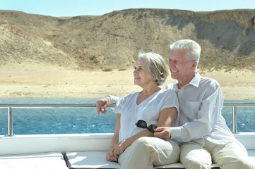 Senior couple having boat ride