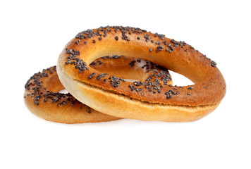 Bagels with poppy seeds isolated on white background