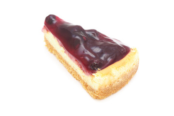 piece of blueberry cheese pie on white background