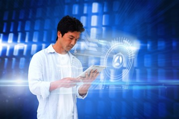 Casual man using tablet with interface