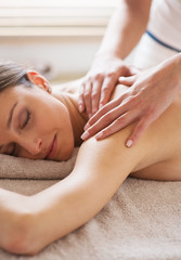Fototapeta na wymiar Relaxing back massage at spa