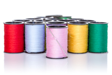 Colorful bobbins with needle