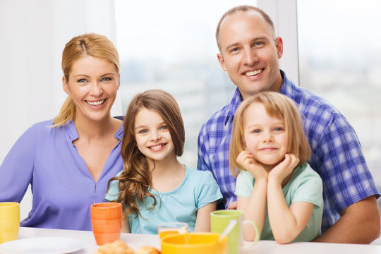 Happy Family With Two Kids With Having Breakfast