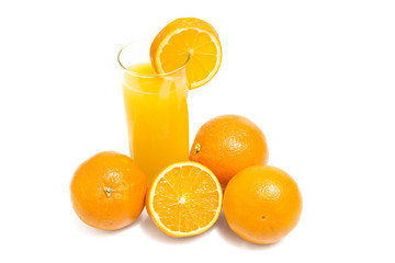 Fresh orange and glass of juice