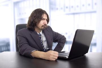 young business man working with is laptop