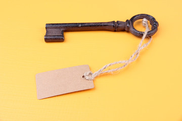 Key with empty tag, on color  background