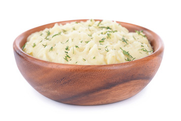 Delicious mashed potatoes with greens in bowl isolated on white