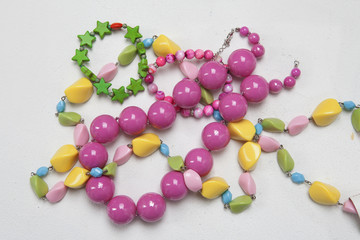 several colored decorations on light background