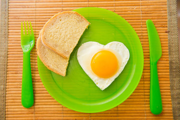 fried egg in the shape of heart