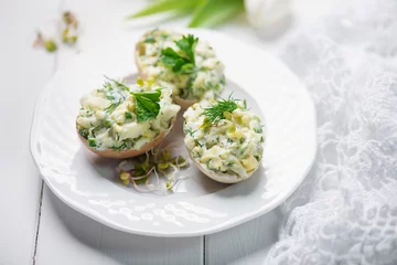 Foto auf Alu-Dibond stuffed eggs with fresh herbs and mayonnaise © Kamila Cyganek