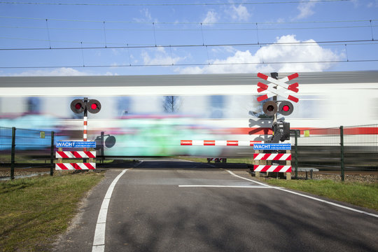 Railway Crossing In Holland