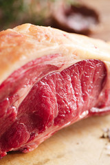 raw beef Rib steak with bone on wooden board and table