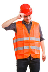 Man worker in safety vest and hard hat. Safety in work.
