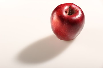 Manzana y sombra
