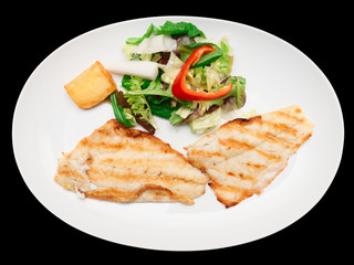 Grilled seabass fillet in plate, isolated