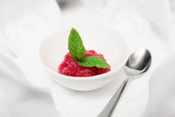 Pomegranate sorbet on restaurant table