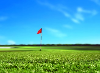 Golf Course Landscape with Red Flag