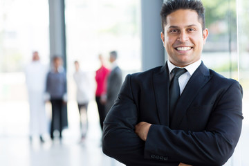 cheerful indian businessman